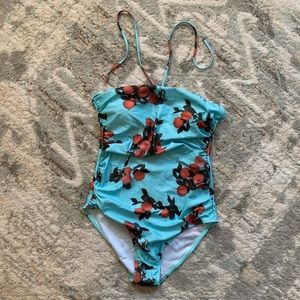 One piece halter tie bathing suit w/ orange print